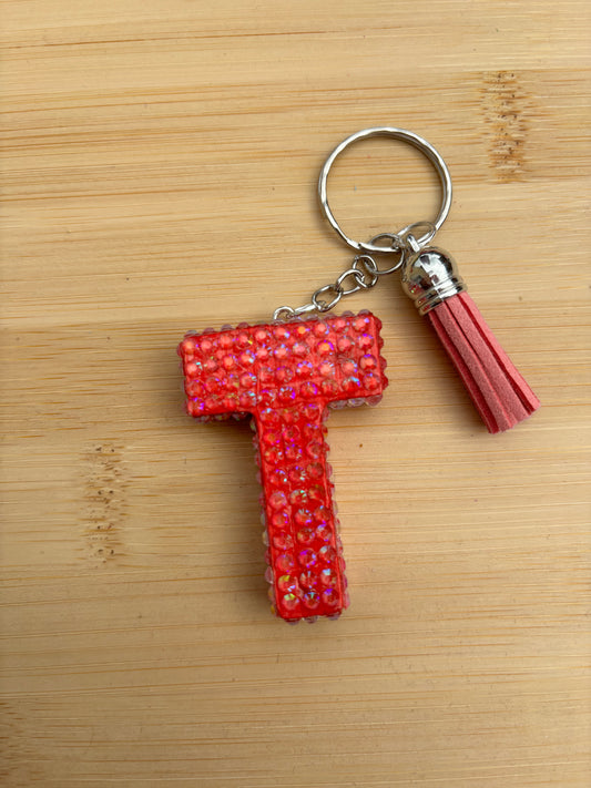 Porte clé en forme de T strassé