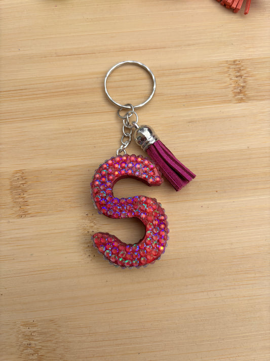 Porte clé en forme de S strassé