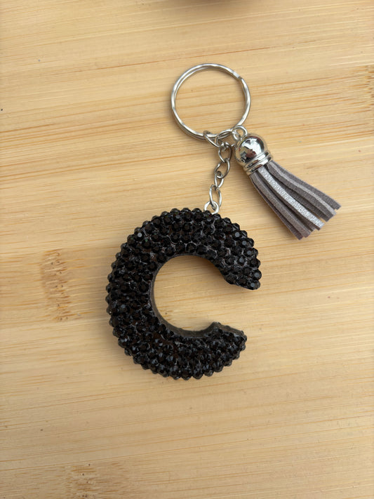 Porte clé en forme de C strassé
