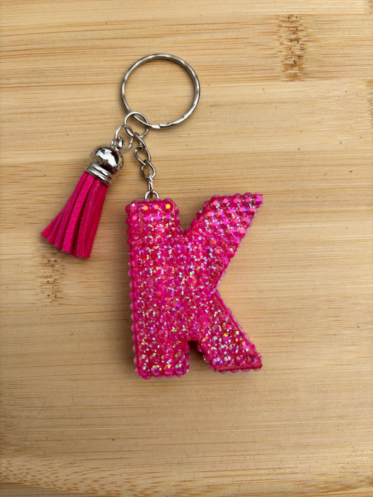 Porte clé en forme de K strassé